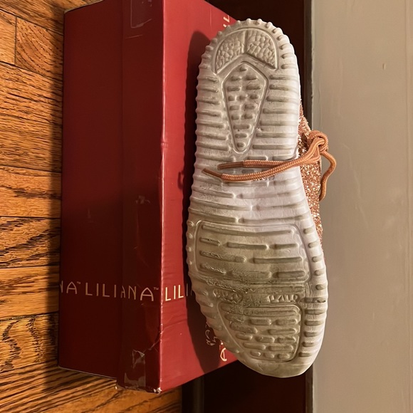 They are sparkly rose gold size 9 shoes. - Picture 2 of 3